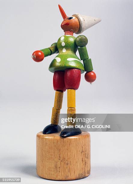 Pinocchio wooden puppet miniature toys shop, 20th century.