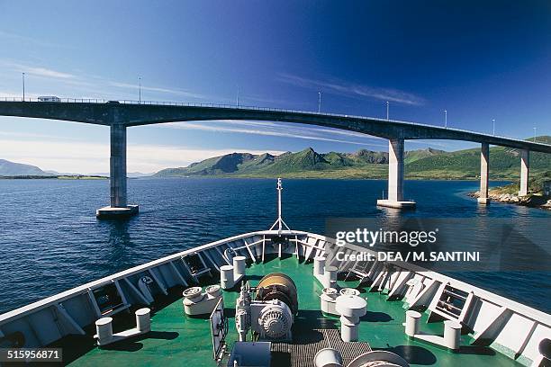 The bridge over the Risoyrenna canal seen from the bow of the Hurtigruten ship, Vesteralen islands, Nordland county, Norway.