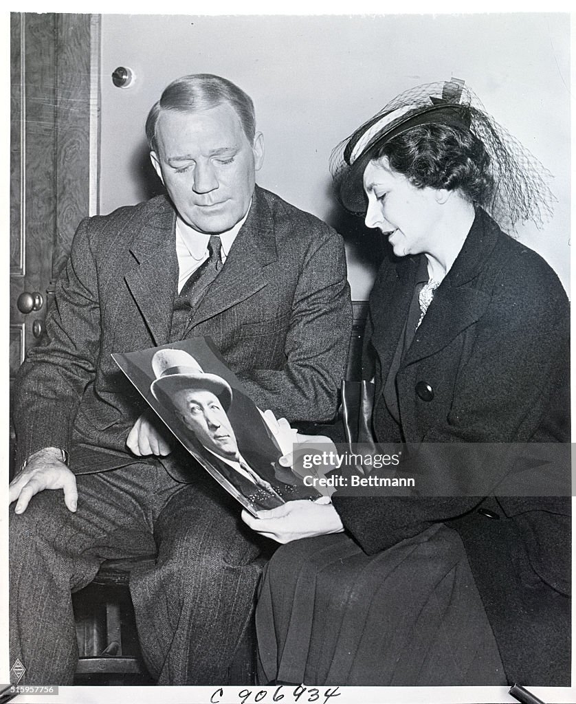 Bonnie Rockne and Pat O'Brien Holding Photo
