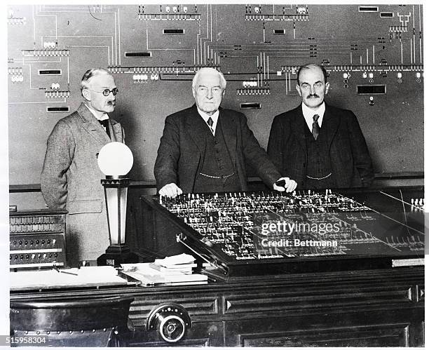 Battersea, England- Mr. Fladgate , manager of the new Battersea power station and Dr. Pearce , engineer in chief and manager of the works, are...