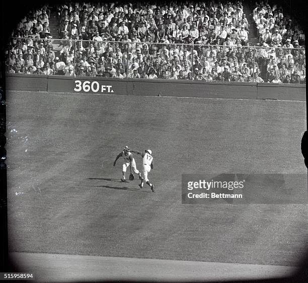 Crosley Field- The beginnings of a collision in the 7th inning began here. Elio Chacon, Cincinnati Reds' second bsaeman, no. 17, reaches for Yogi...
