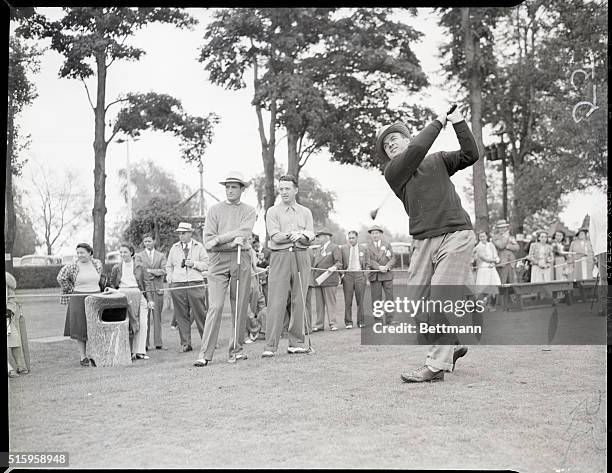 Mamaroneck, New York- Bob Clark of St. Paul , and Ray Billows of Poughkeepsie watching as Jess W. Sweetser of Bronxville, NY, drove off in the...