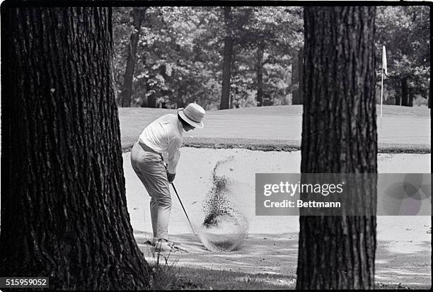 Oak Park, IL- Judy Bell of Colorado Springs, Colorado blasts out of a sand trap on the 15th hole during match play in the Women's Western Open Golf...