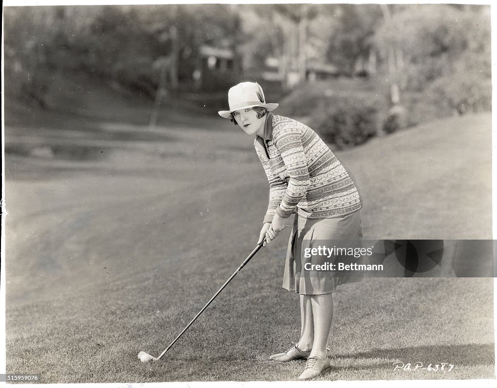 Mildred Harris Shown Golfing
