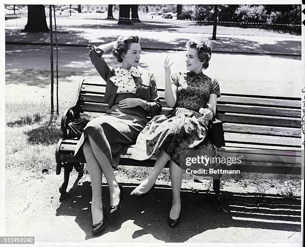 London, England- Seated on a bench in London's famous Hyde Park, actresses Deborah Kerr and Jean Seberg discuss the movie they will make together of...