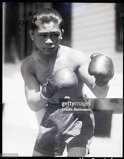 SaratogaPancho Villa, the flyweight champion, has established training quarters in which to prepare for some future bouts. Photo shows Villa in...