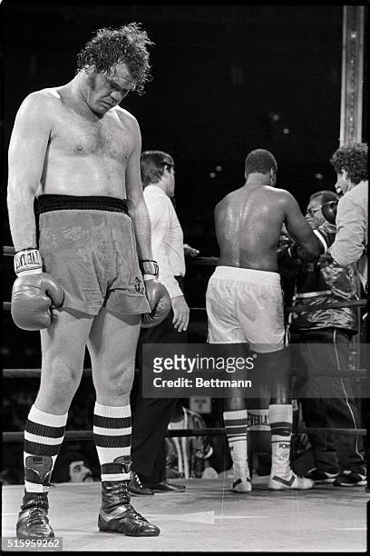 Houston, TX- A dazed Randy Cobb stands in the middle of the ring in the 9th round after the referee stopped the fight briefly for a repair to WBC...