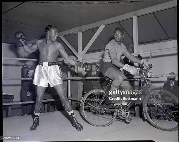 Summit, NJ- Since Chuck Davey is a fast-moving ring opponent, welterweight champion Kid Gavilan figured that he'd better include a bike-rider in his...