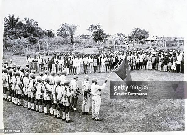 Northern Angola- Crowds of natives who have recently come out of hiding in the jungle line up before a contingent of Portuguese troops here. The...