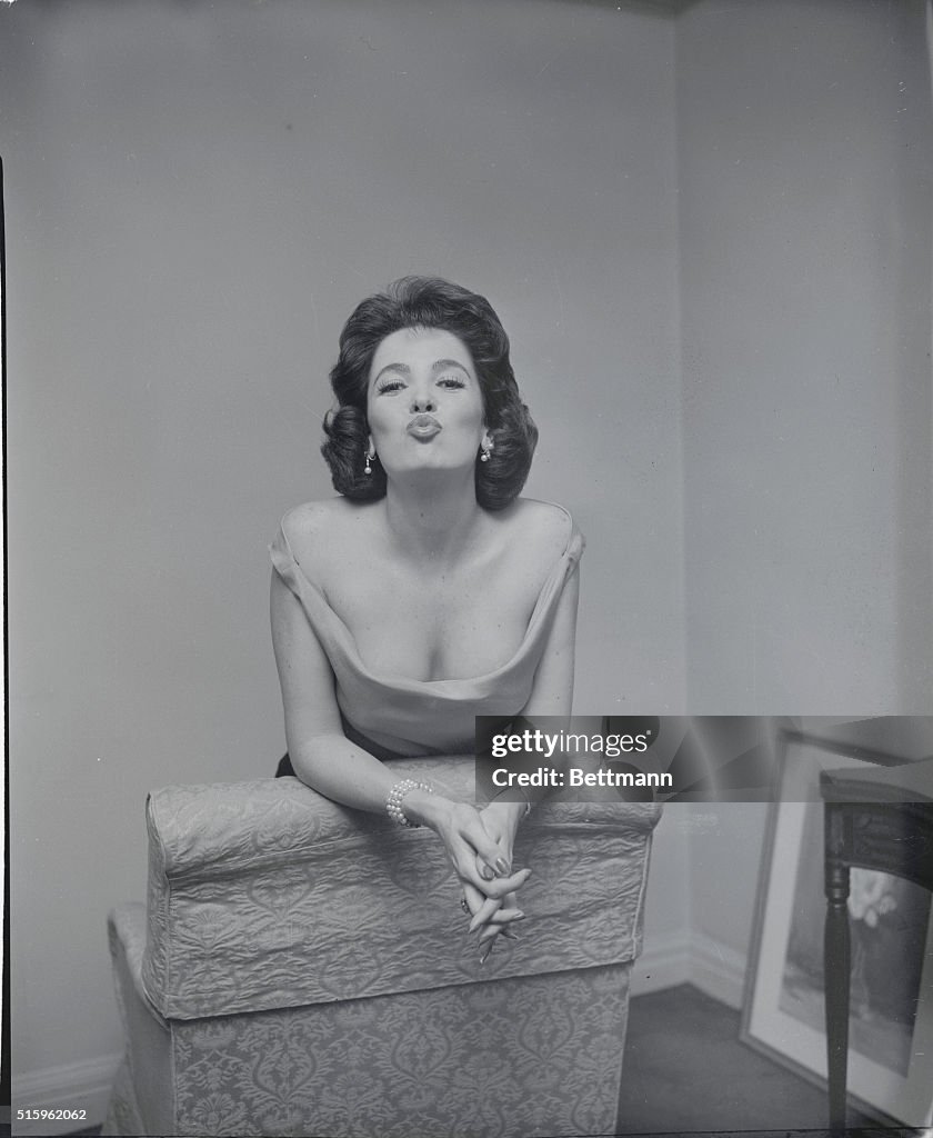 Actress Linda Cristal Posing on Chair
