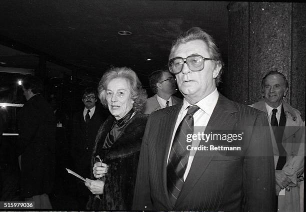 New York: Veteran actor Robert Mitchum and his wife arrive at the theater for the premiere of his new film, "That Championship Season."