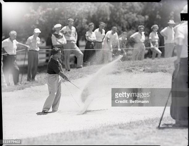 Louisville, KY- Jim Turnesa blasts out of the sand trap during the final playoffs of the PGA tournament in Louisville. Turnesa won the coveted trophy...