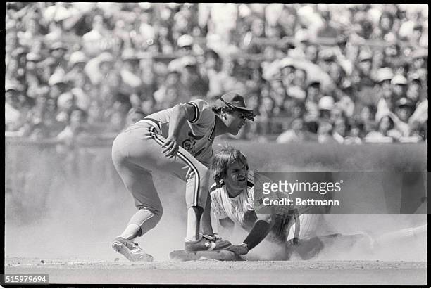 Philadelphia, Pennsylvania-Philadelphia Phillies' Pete Rose steals third base in the seventh inning in Philadelphia as he beats the throw to St....