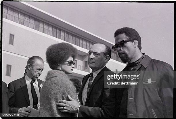 Oakland, California-Black Panther leader Eldridge Cleaver , and his wife Kathleen , and attorney Charles Garry stand outside the Alameda County...