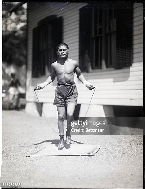 SaratogaPancho Villa, the flyweight champion, has established training quarters in which to prepare for some future bouts. He is shown skipping rope.