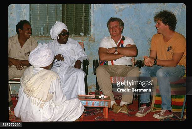 Kassala, Sudan Edward Kennedy shares a cup of tea with some unidentified government officials. He is in Africa to view the famine situation here. On...