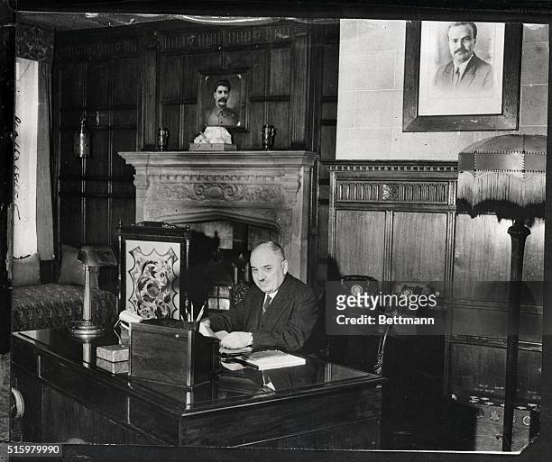 London, England-M. Miasky, Soviet ambassador to britain, reads congrats on his award Order of Lenin in London.