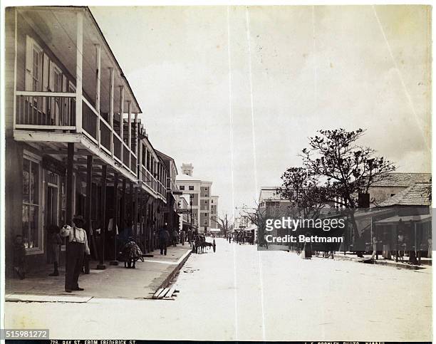 Nassau, The Bahamas: Photo shows a view down Bay Street from Frederick St. Ca. Late 19th century.