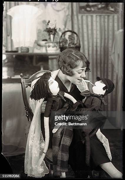 New York, New York - Anna Held, daughter of musical comedy star of same name, at her novelty shop in Greenwich Village. Photo shows Anna Held with 2...