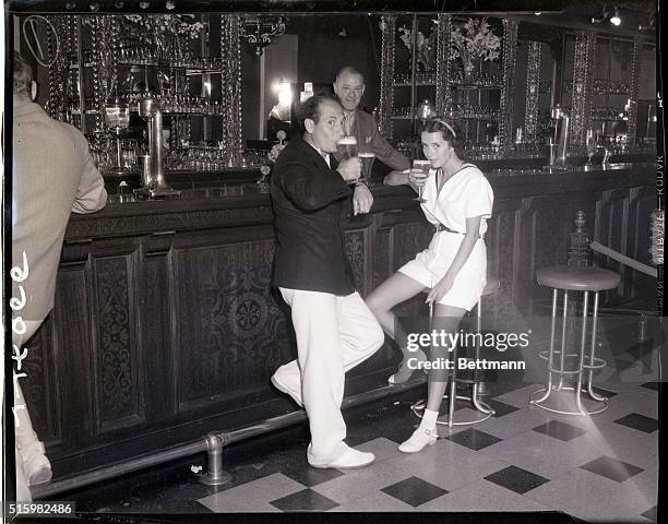 Agua Caliente, CA- Harpo Marx, one of the four famous brothers who have delighted movie goers with their antics, photographed with Susan Fleming,...