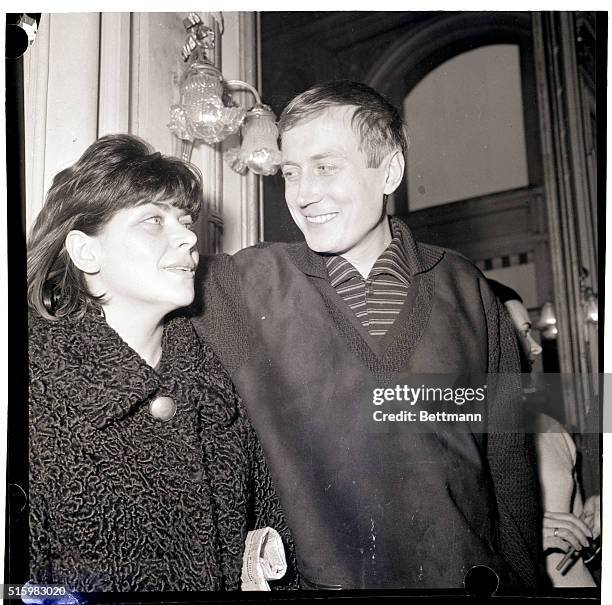 Paris, France- Poet Yevgeni Yevtushenko, considered Russia's "angry young man," and his wife, Galina, look at each other in a poetic mood after a...