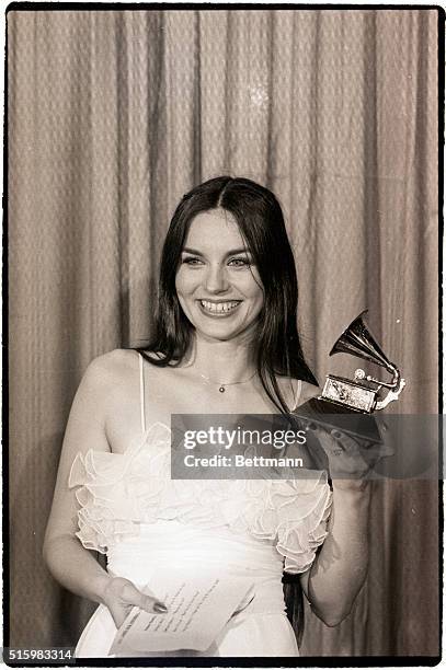 Los Angeles, CA- Country music singer, Crystal Gayle, is shown posing with her Grammy Award which she won at the 20th Annual awards. She won for the...