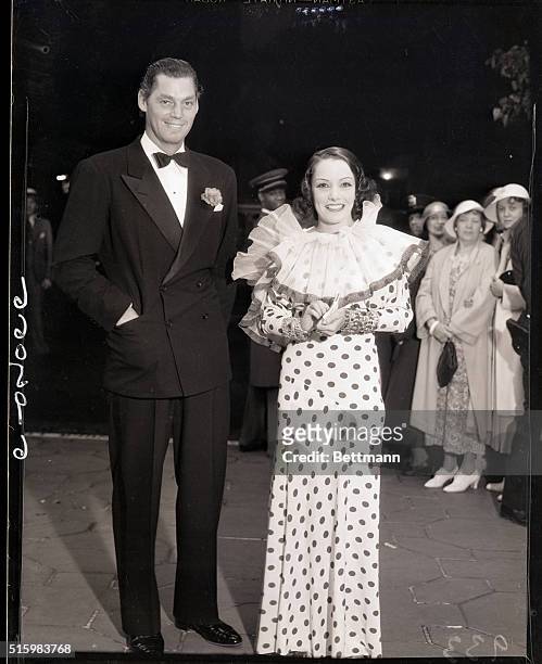 Los Angeles, CA- Johnny Weismuller and Lupe Velez are shown at the El Capitan Theatre in Hollywood to attend the premier performance of Gregory...