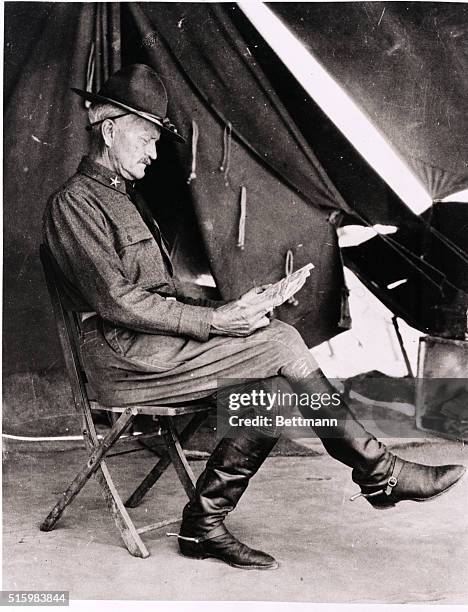 General John Pershing is shown reading his newspaper in Mexico during the time when he commanded forces chasing Pancho Villa.