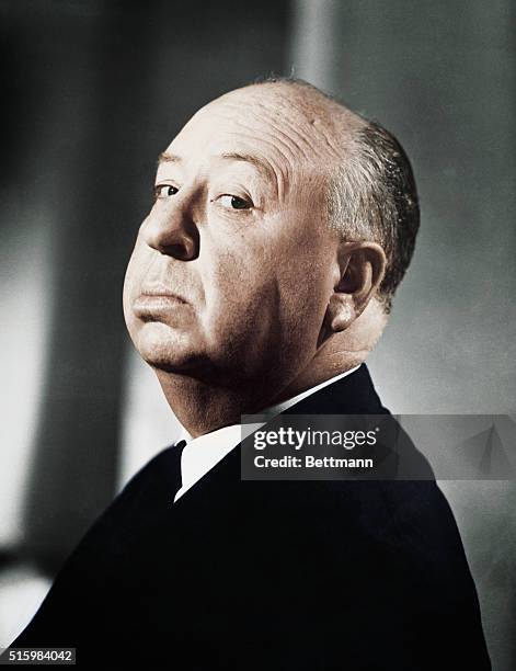 Director Alfred Hitchcock in a typical pose. Undated Photo.