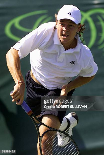 Guillermo Coria of Argentina serves to fellow countryman Franco Squillari 23 March 2001 during men's second round action at the Ericsson Open Masters...