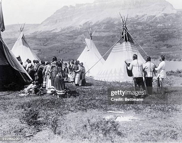Group of Native Americans perform an Elk Medicine dance in Glacier National Park.