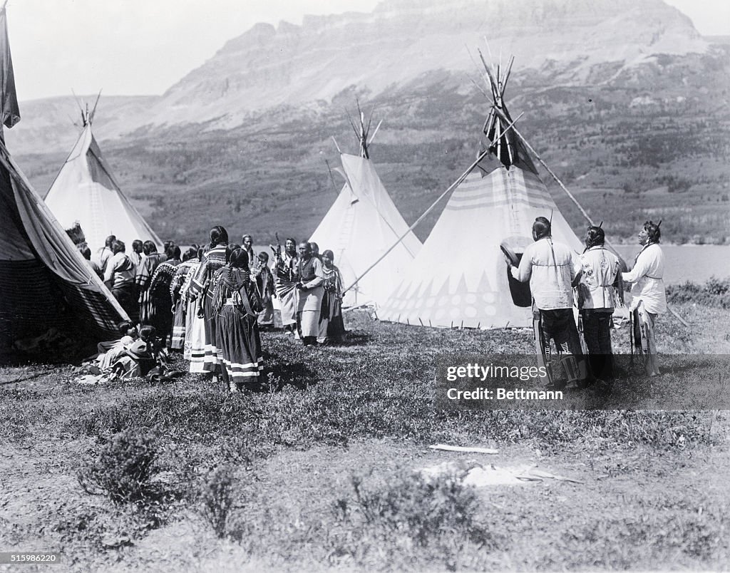 Native Americans Dance Amongst Teepees