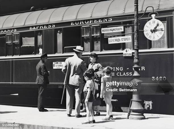 Bulgaria: The Orient Express pauses on its way through Bulgaria. While the engines are changed the passengers disembark and stroll about, glad for...