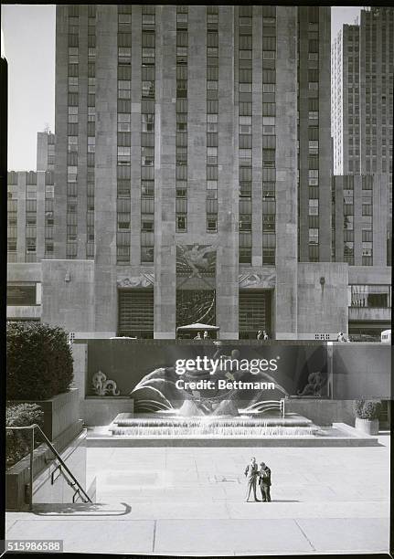 New York, NY: Rockefeller Center, a view from the Sunken Plaza looking towards the central building.