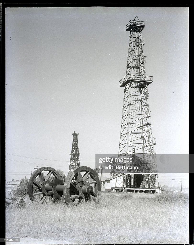 Oil Derricks View of an oil well near Carrier, Oklahoma. Two derricks appear in ...