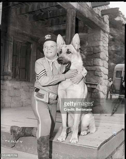 Ca. 1954-1959-Lee Aaker holds Rin Tin Tin in a still from the episode, "Rin Tin Tin and the Lost Patrol" from the 1954-1959 television show, "The...