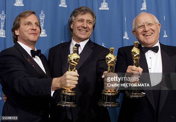 Producers Douglas Wick , David Franzoni and Branko Lustig hold their Oscars for Best Picture for "Gladiator" at the 73rd Annual Academy Awards at the...