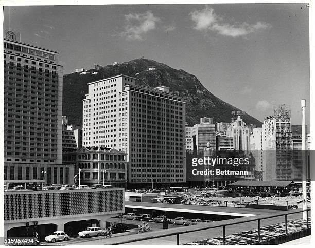 Hong Kong - British Crown Colony. New buildings on the waterfront. On left, the Mandarin Hotel, St. George's building, the Union building, the...