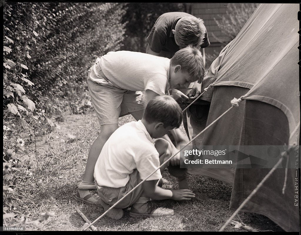 Boys Behind Tent