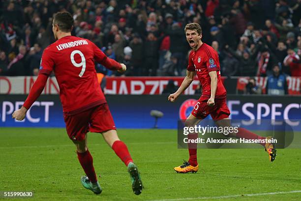 Thomas Muller of Bayern Muenchen celebrates scoring his team's second goal during the UEFA Champions League round of 16, second Leg match between FC...