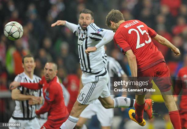 Thomas Mueller of Bayern Muenchen heads the equalizer during the UEFA Champions League Round of 16 second leg match between FC Bayern Muenchen and...