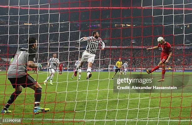 Thomas Muller of Bayern Muenchen heads the ball to score his team's second goal during the UEFA Champions League round of 16, second Leg match...