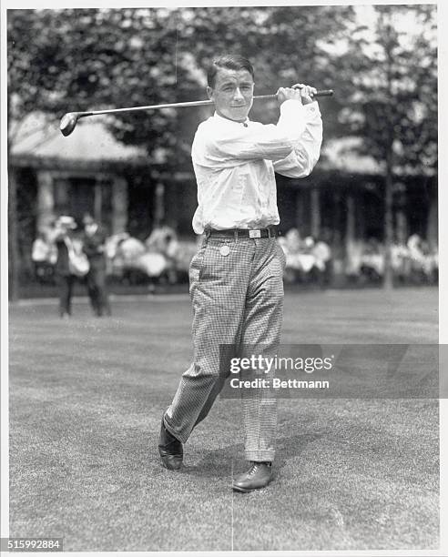 Rye, New York: Gene Sarazen swinging his golf club at the Westminster Biltmore Club.