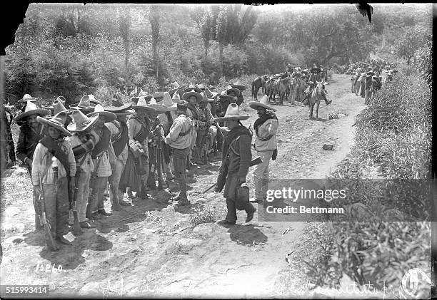 Xochmilco, Mexico-Zapatistas resting and receiving orders before an attack on federal troops.