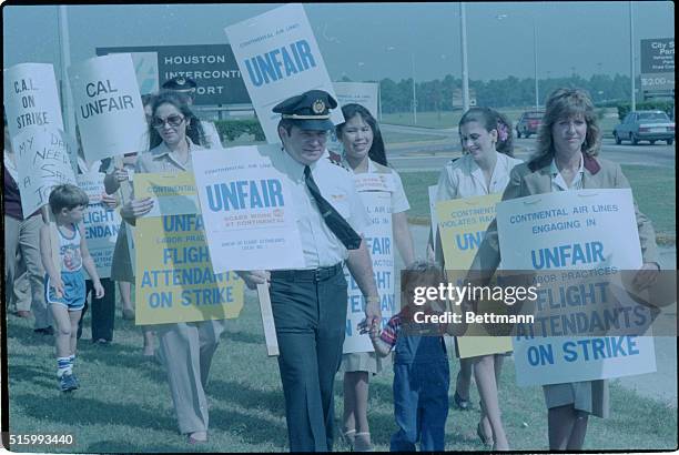 Houston, Texas-Continental Airlines' striking employees rally at Intercontinental Airport. More than 500 striking pilots, flight attendants and...