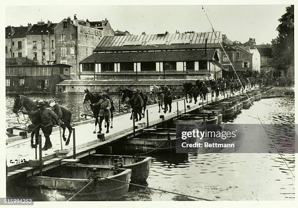 French Cavalry crossing one of the pontoon bridges built across the river Marne in less than three hours to facilitate the pursuit of the retreating...