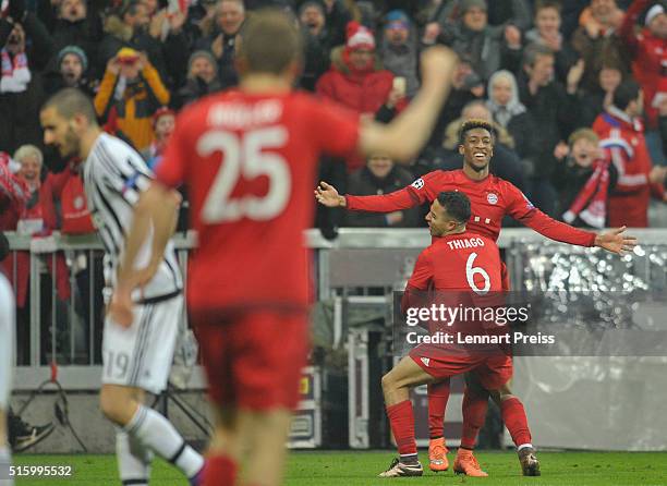 Kingsley Coman , Thiago Alcantara and Thomas Mueller of Bayern Muenchen celebrate their team's fourth goal during the UEFA Champions League Round of...