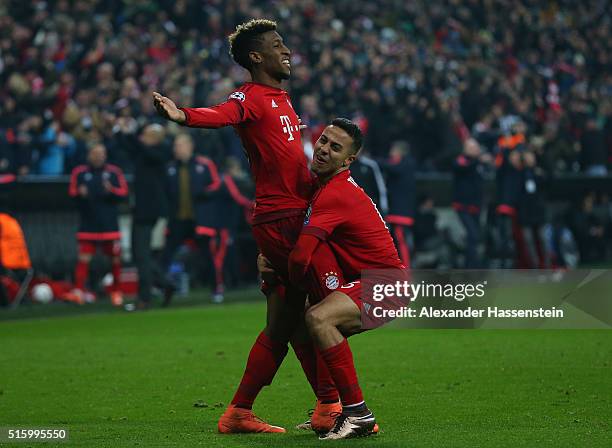 Kingsley Coman of Bayern Muenchen celebrates scoring his team's fourth goal with his team mate Thiago Alcantara during the UEFA Champions League...