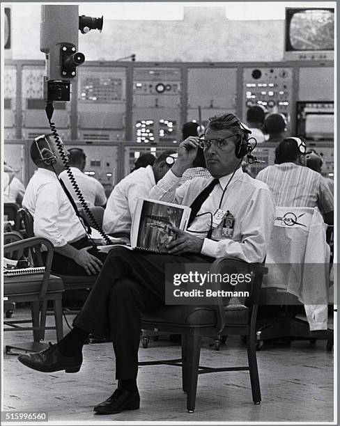 Wernher Von Braun , German-born American Engineer and pioneer experimenter with rockets. Shown in a U.S. Mission control room. Undated photograph.