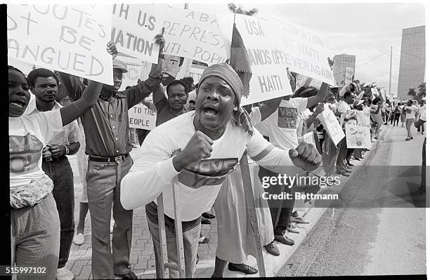 Miami, Florida- About four hundred Haitians marched and rallied in the streets fo downtown Miami to mark the anniversary fo their country's freedom...